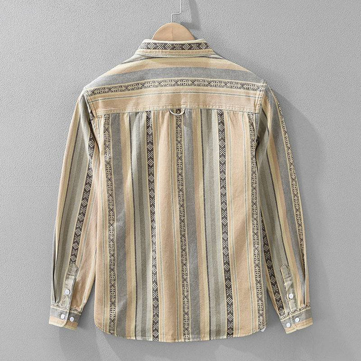 Casual men's striped Medina shirt, relaxed fit, styled open for summer. Everyday button-down, textured fabric.