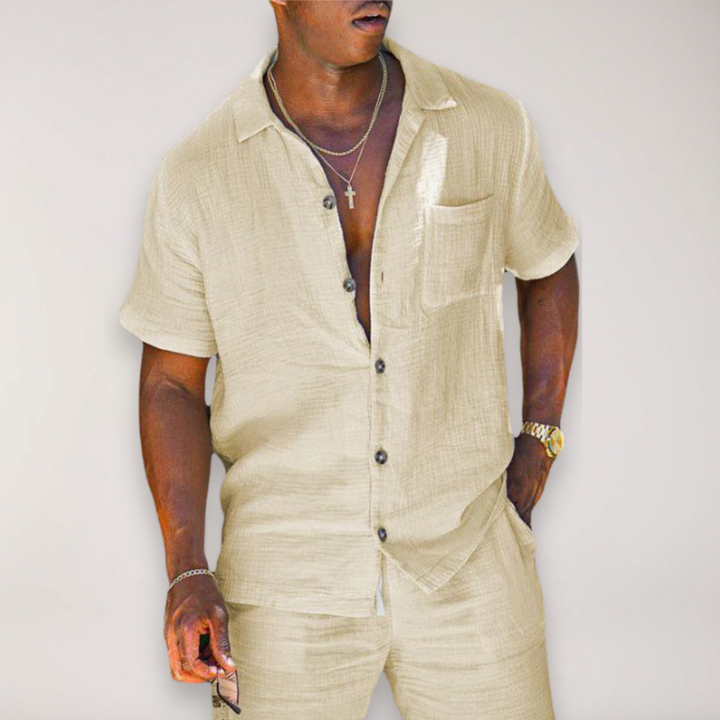 Stylish men's two-piece casual summer ensemble: short-sleeve shirt and matching shorts. Ideal for beach and leisure.