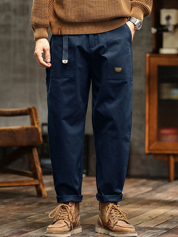 Men's relaxed fit utility pants in classic khaki, perfect for versatile everyday casual wear and modern style.