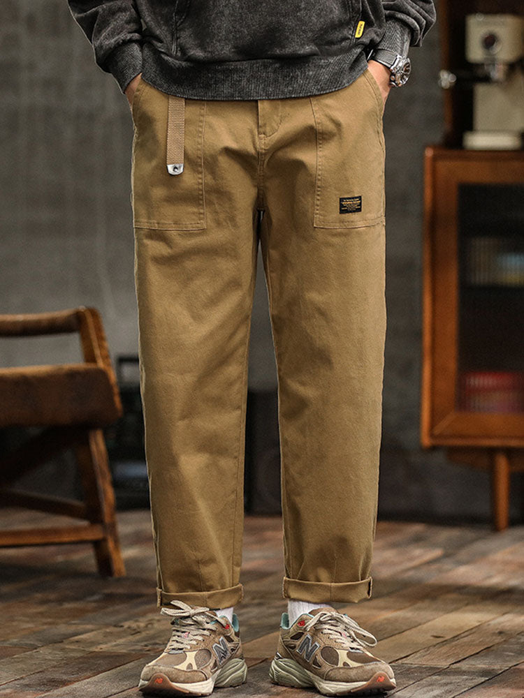 Versatile men's relaxed fit pants in charcoal gray, ideal for casual outfits and comfortable, modern fashion.
