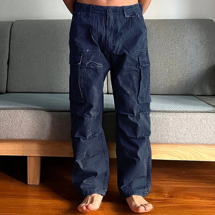 Back view: Men's relaxed fit washed chino cargo pants, showing comfortable fit and durable design for daily wear.