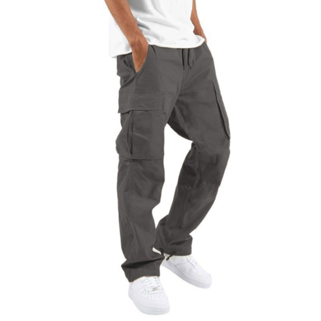 Streetwear-inspired men's relaxed fit wide leg cargo pants, offering comfort and style with spacious utility pockets.