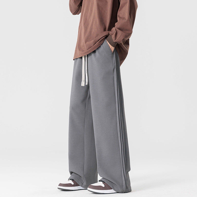 Versatile men's wide leg drawstring pants for a stylish, relaxed, and comfortable feel.