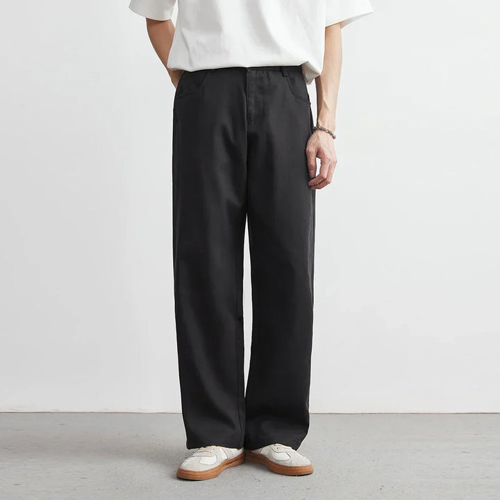 Stylish black men's wide leg utility pants with a relaxed fit, great for casual fashion & comfort.