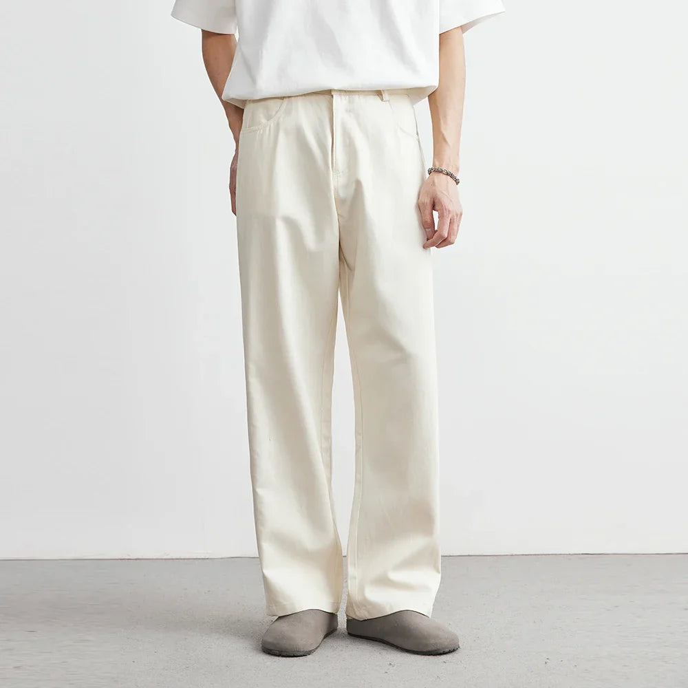 Comfortable men's apricot wide leg utility pants, relaxed fit, ideal for versatile everyday wear.