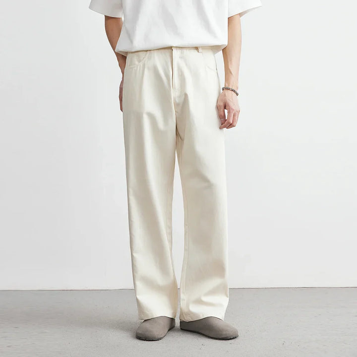Comfortable men's apricot wide leg utility pants, relaxed fit, ideal for versatile everyday wear.