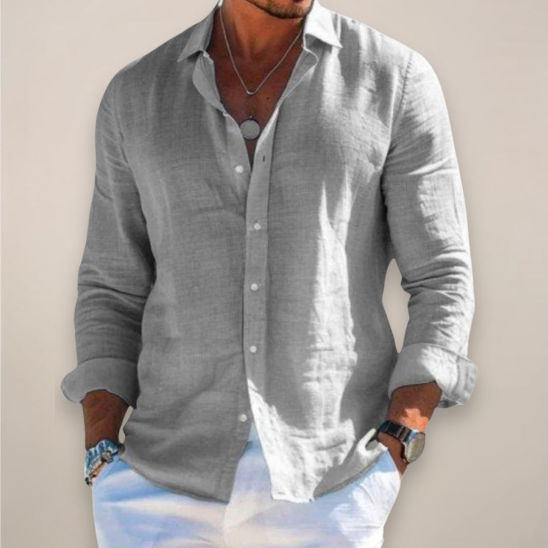 Casual men's long sleeve button-up shirt for summer comfort. Relaxed fit menswear essential.
