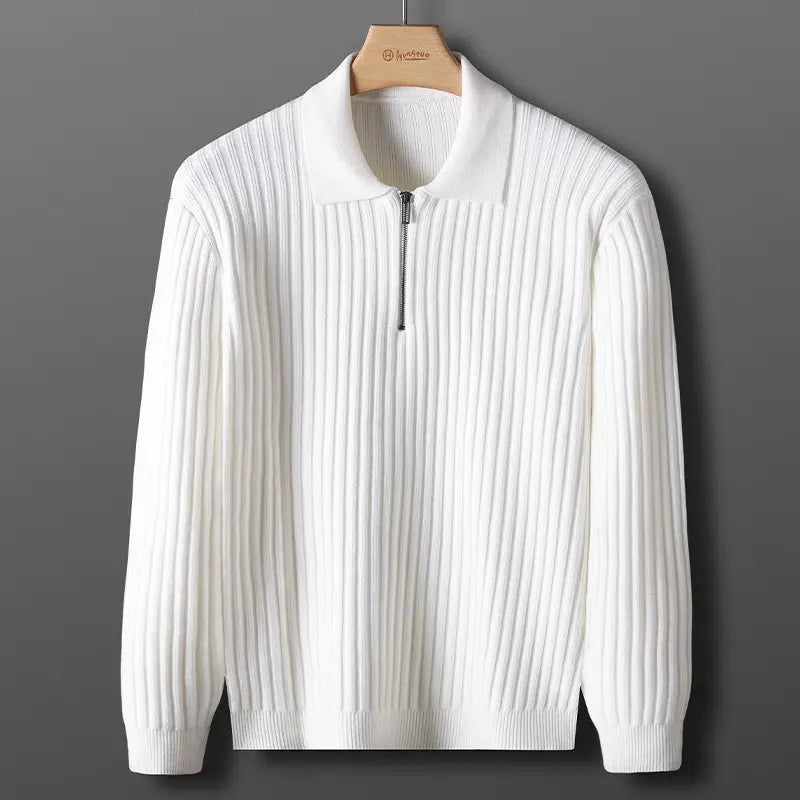 Close-up of the ribbed detail and zip-neck collar on a men's casual winter sweater.
