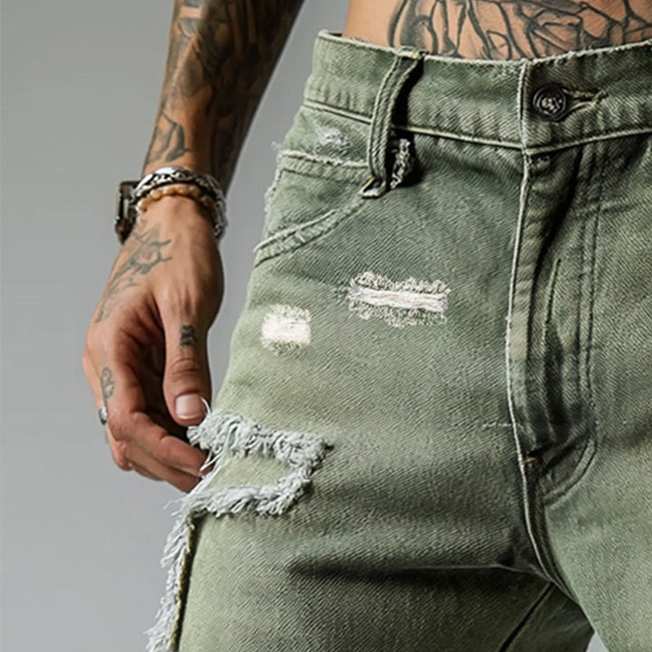 Summer men's casual ripped denim shorts with stretch. Comfortable five-pocket distressed style, straight leg, fashion wear.