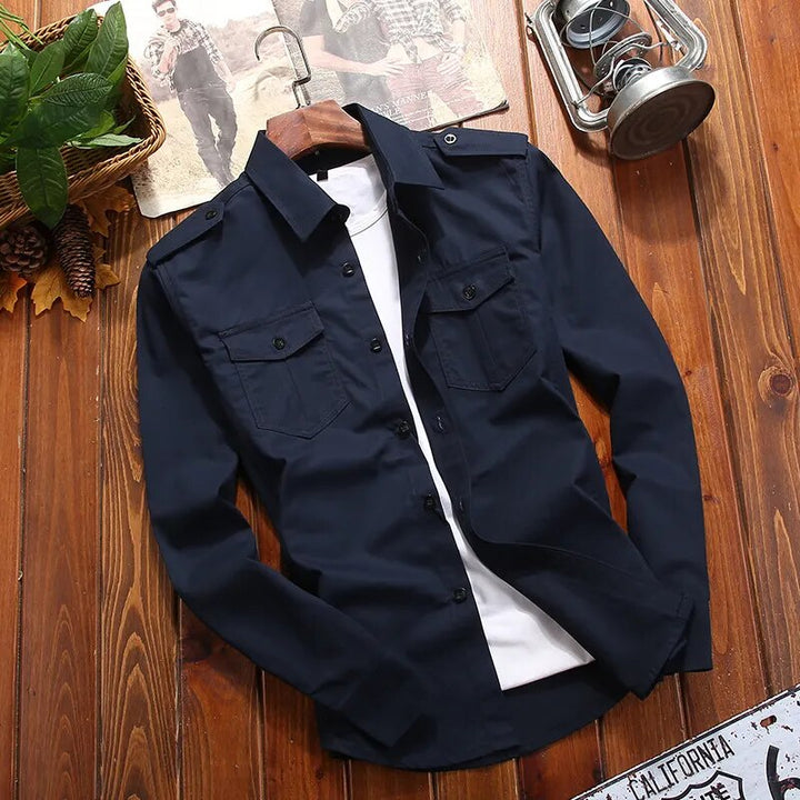 Khaki men's tactical utility shirt featuring epaulettes and two chest pockets. Durable military style for adventure.