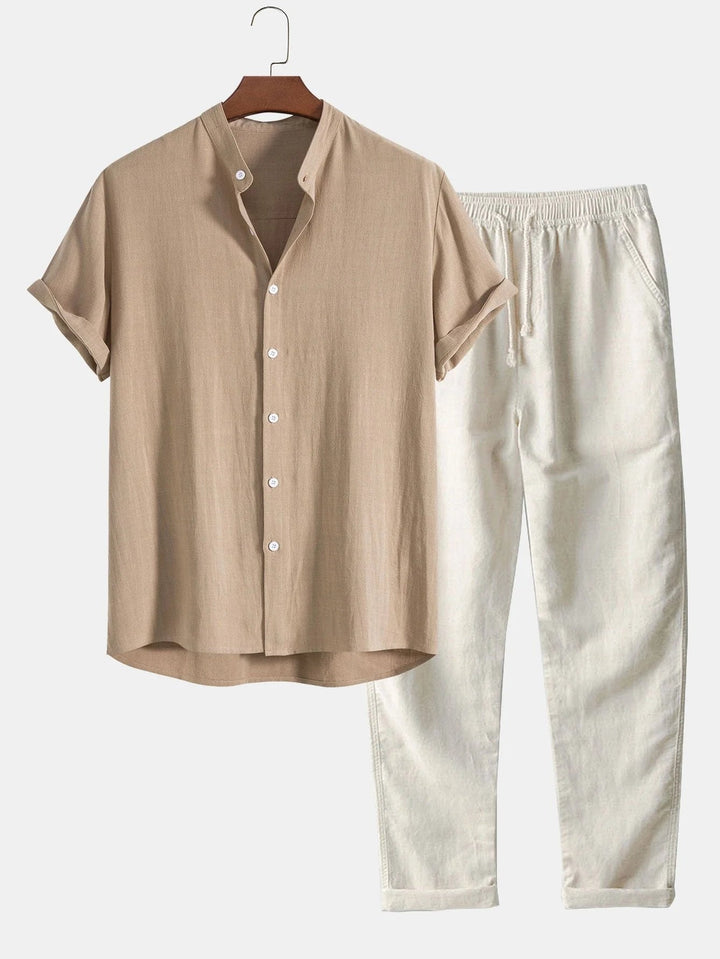 Comfortable men's summer outfit set with rolled cuff shirt & matching pants for relaxed style.