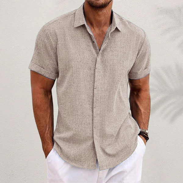 Men's casual button-down shirt with short sleeves, a classic style offering comfort & versatility.