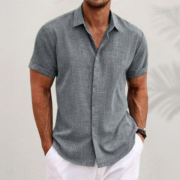 Stylish men's casual button-down shirt, perfect for summer fashion & everyday wear.