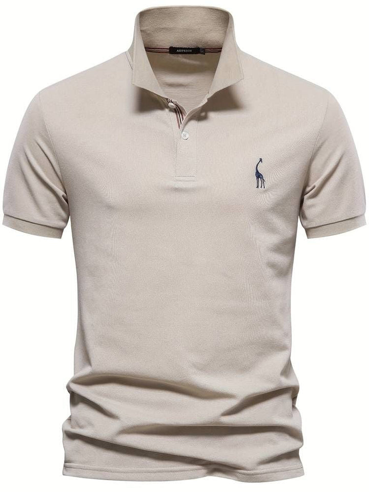 Men's short sleeve golf polo, embroidered giraffe detail, perfect for casual style & active comfort.