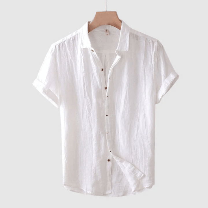 Stylish men's button-up short sleeve shirt, ideal for warm weather, vacations, or everyday relaxed wear.