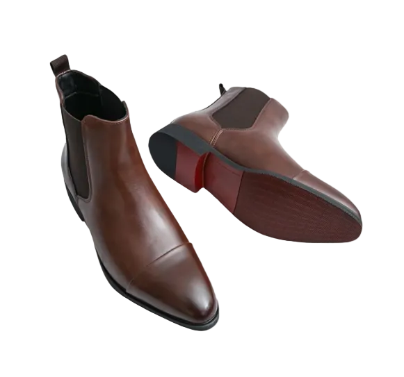 Elegant men's brown Chelsea ankle boots with elastic panels, offering comfortable and stylish footwear.