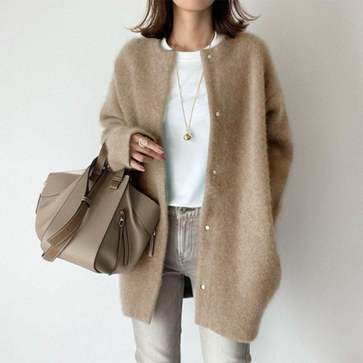 Model wearing a men's slim fit camel winter coat, styled for a classic, warm look.