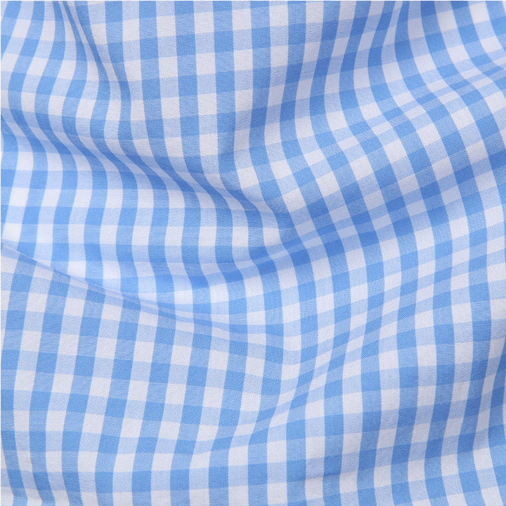 Trendy men's slim fit checkered button down shirt. Essential long sleeve for a fashionable and refined outfit.