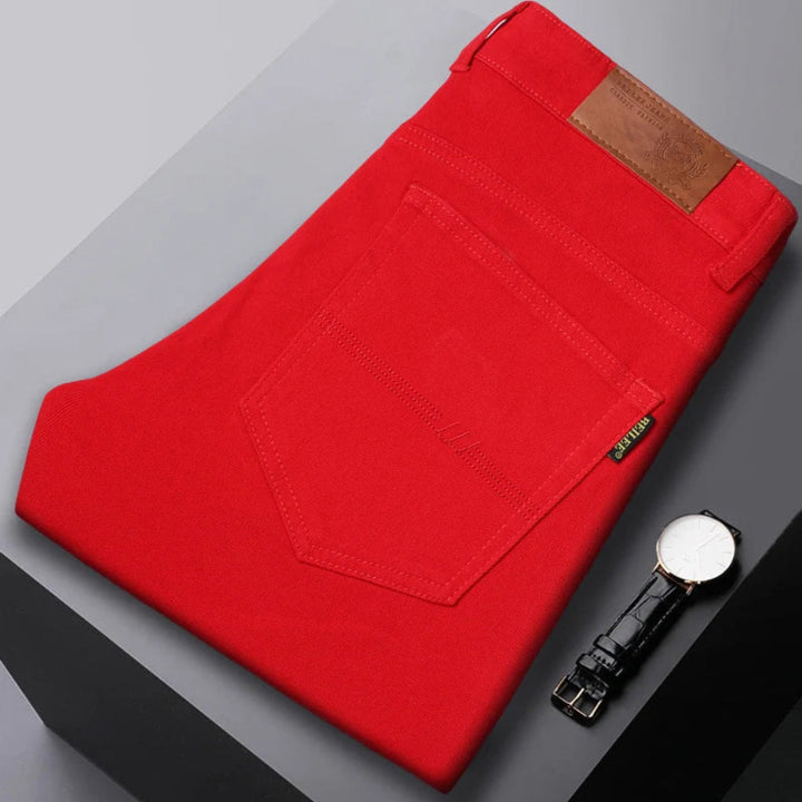 Full length view of men's slim fit denim jeans, showcasing modern tailored design & casual comfort.