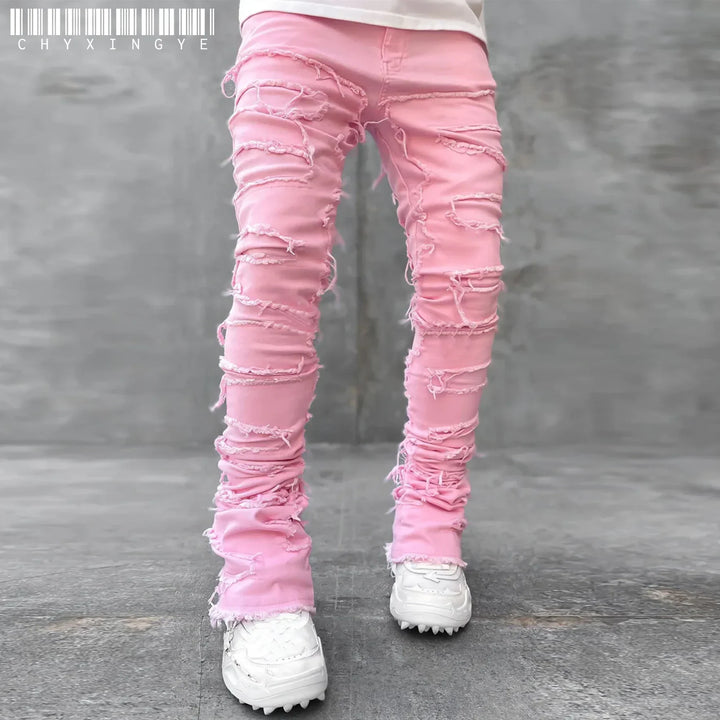 Stylish men's gray slim fit jeans with distressed rips. Perfect for urban fashion & a modern edgy look.