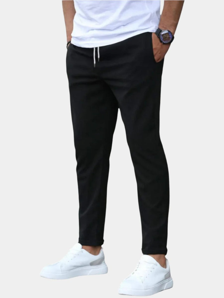 Men's slim fit drawstring chino pants for ultimate comfort and versatile everyday wear.