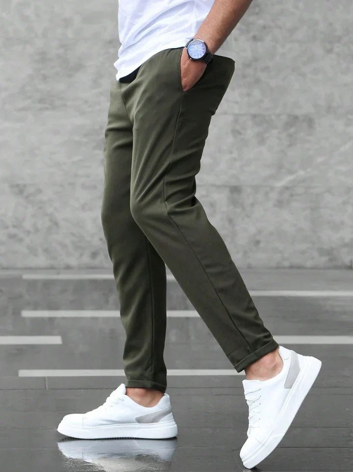 Contemporary men's slim fit drawstring chino pants, a staple for modern wardrobes.