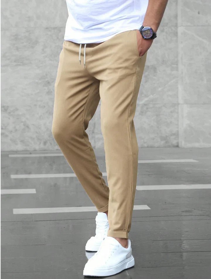 Effortlessly stylish men's slim fit drawstring chino pants, enhancing casual looks.