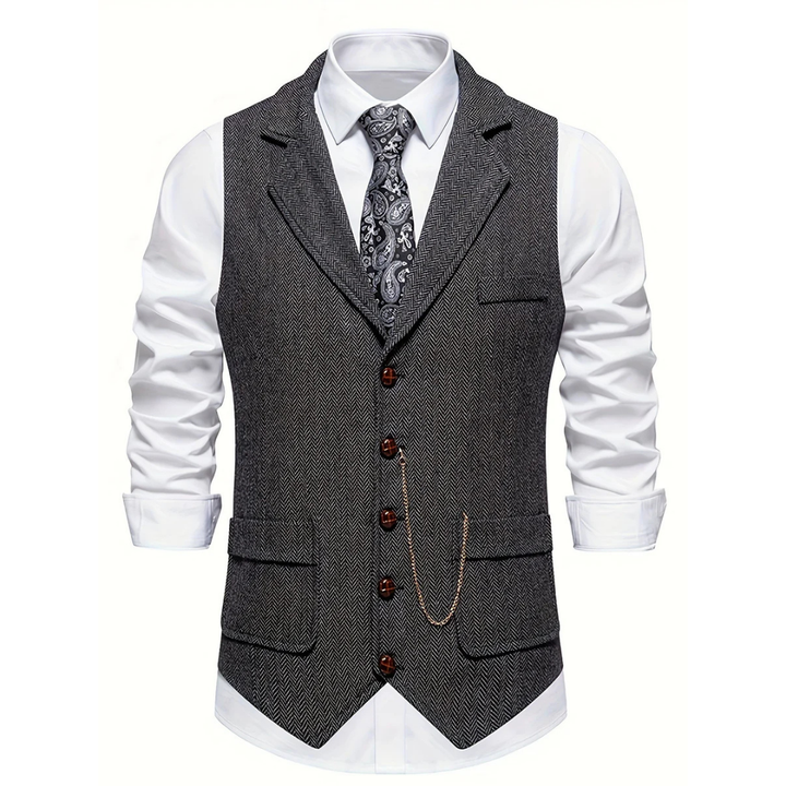 Tailored men's slim fit herringbone vest, exuding classic elegance, suitable for formal or smart casual attire.