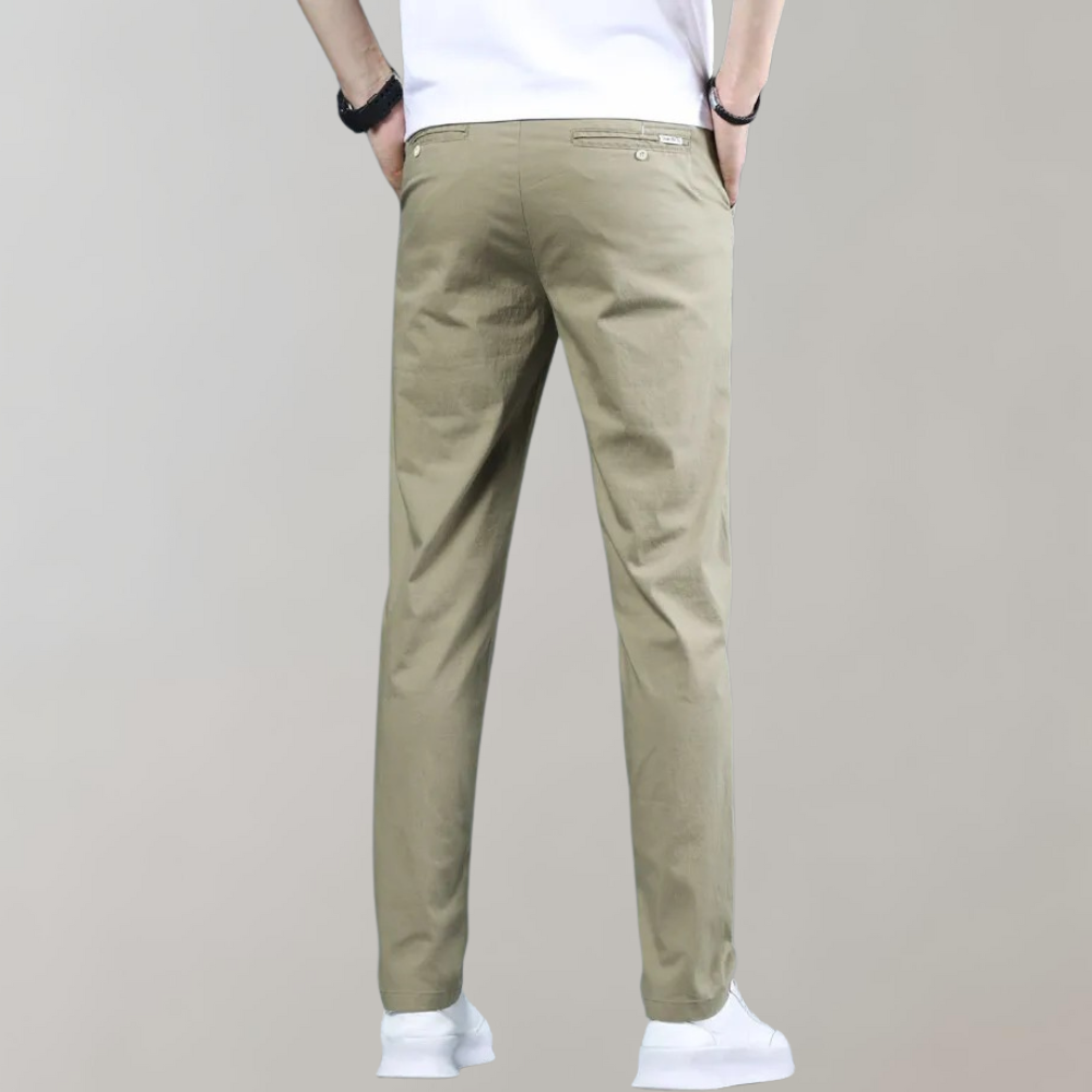 Grey slim-fit casual pants for men, offering comfort and contemporary style