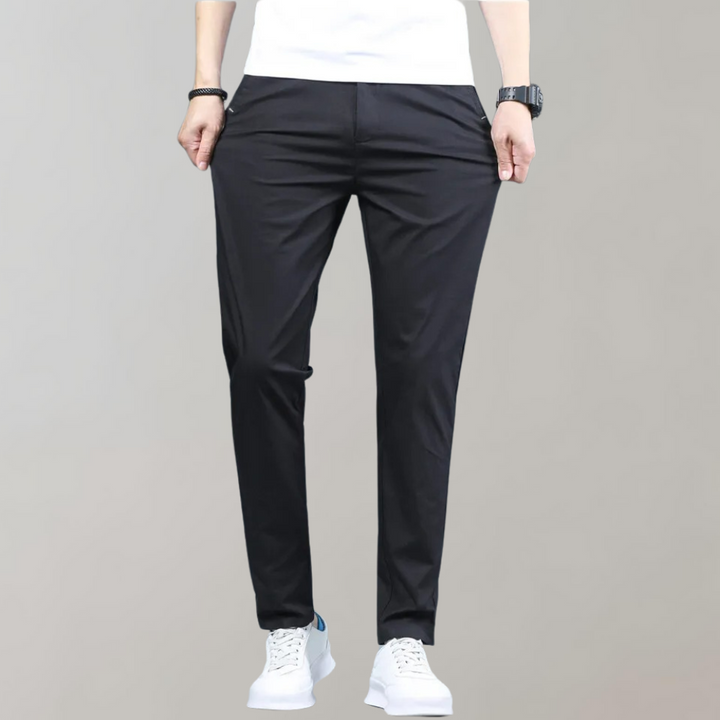 Detailed shot of pocket on men's slim-fit casual pants, emphasizing quality