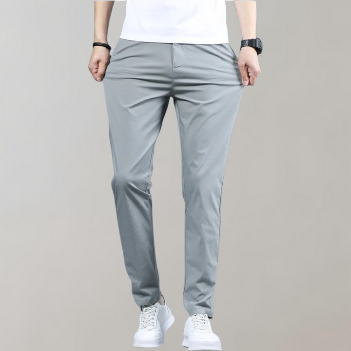 Full-length view of men's black slim-fit casual trousers, ideal for fashion