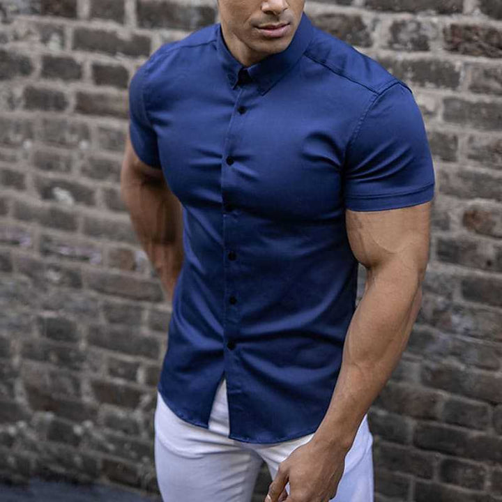 Stylish men's short sleeve casual shirt in a slim fit. Lightweight top for essential summer & spring fashion.