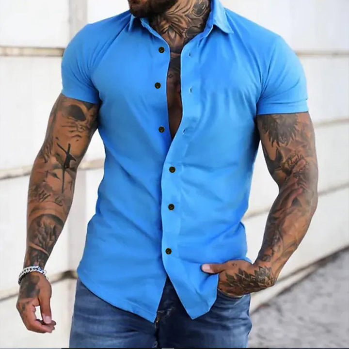 Wearing a men's slim fit short sleeve casual shirt. Lightweight and stylish for versatile spring & summer fashion.