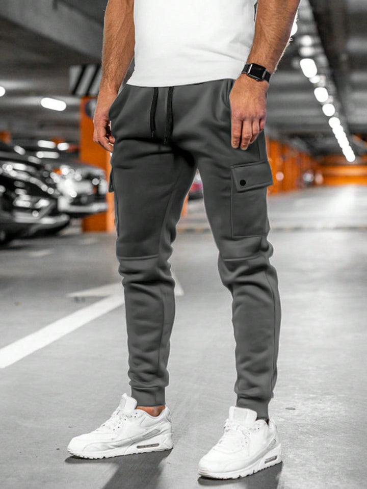 Sporty men's slim-fit joggers, ideal for casual outings and everyday activities.