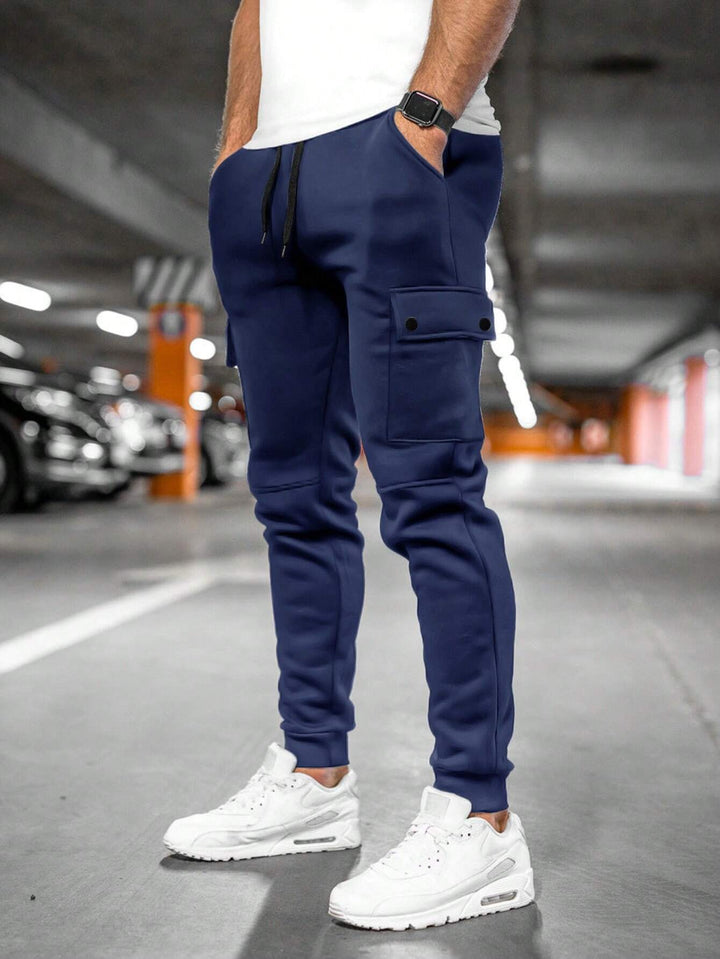 Men's slim-fit joggers with adjustable drawstring waist for optimal comfort & streetwear look.
