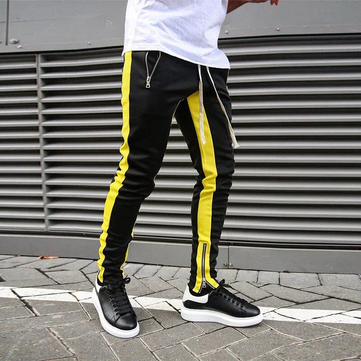 Stylish men's slim fit activewear sweatpants with functional zip hems for ultimate comfort and versatility.