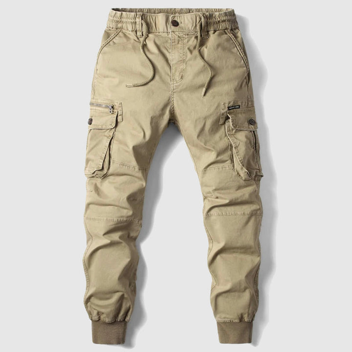 Stylish men's cargo jogger pants, slim fit with tapered leg, perfect for modern casual fashion and streetwear outfits.