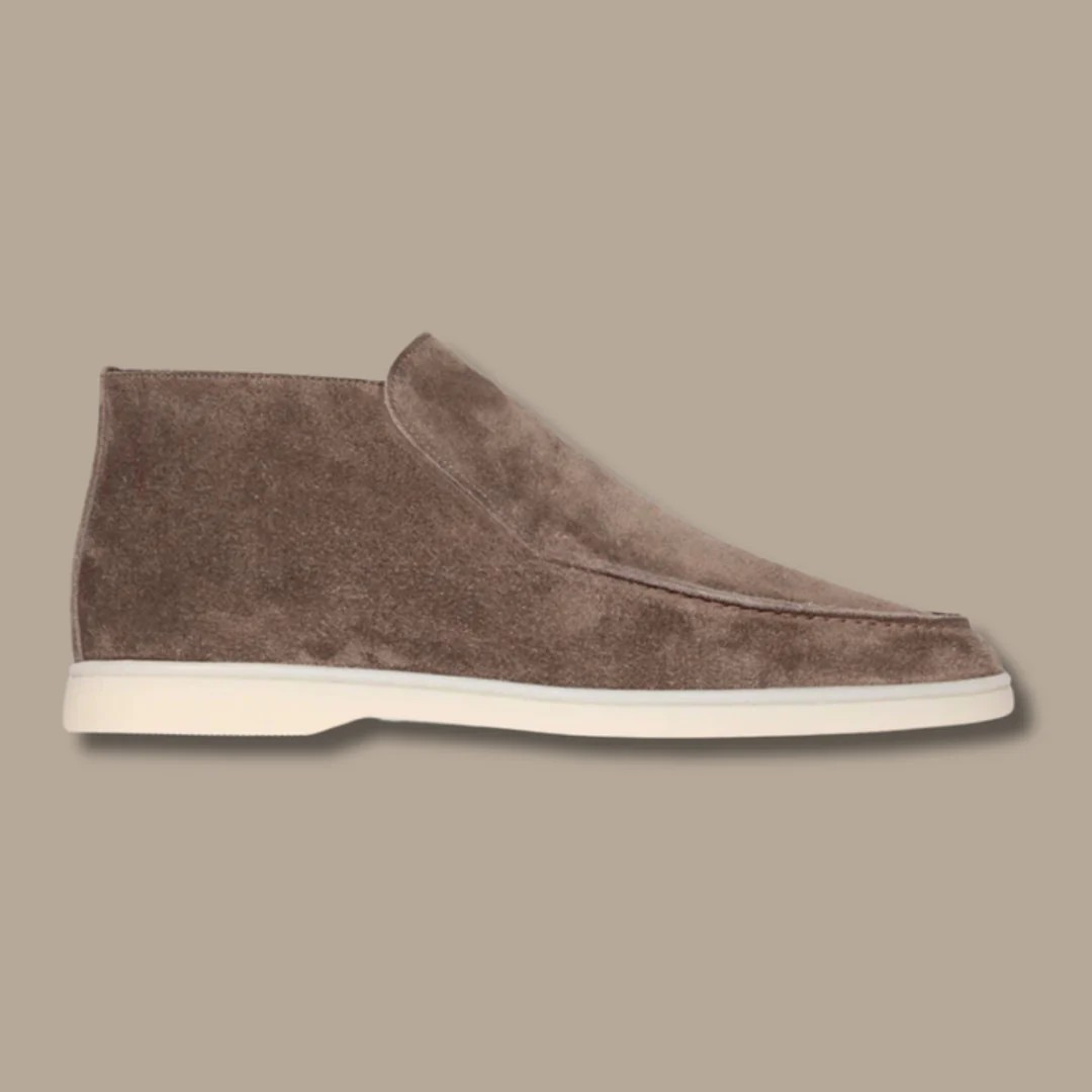 Close-up of a men's sophisticated ankle loafer, showcasing slip-on design for smart casual elegance & comfort.