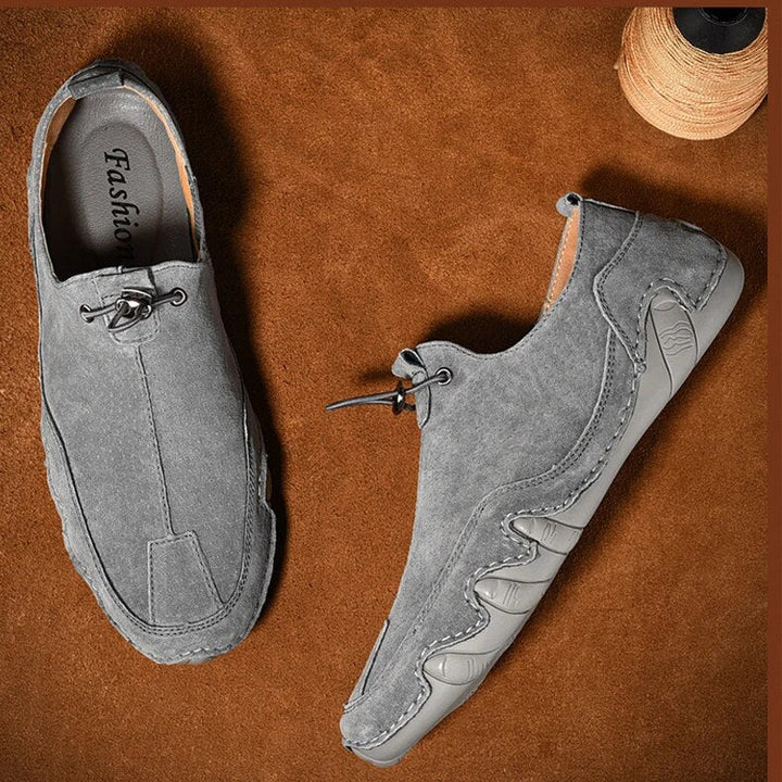 Comfortable men's slip-on casual shoes, lightweight with adjustable fit. Perfect everyday loafers for outdoor flats.