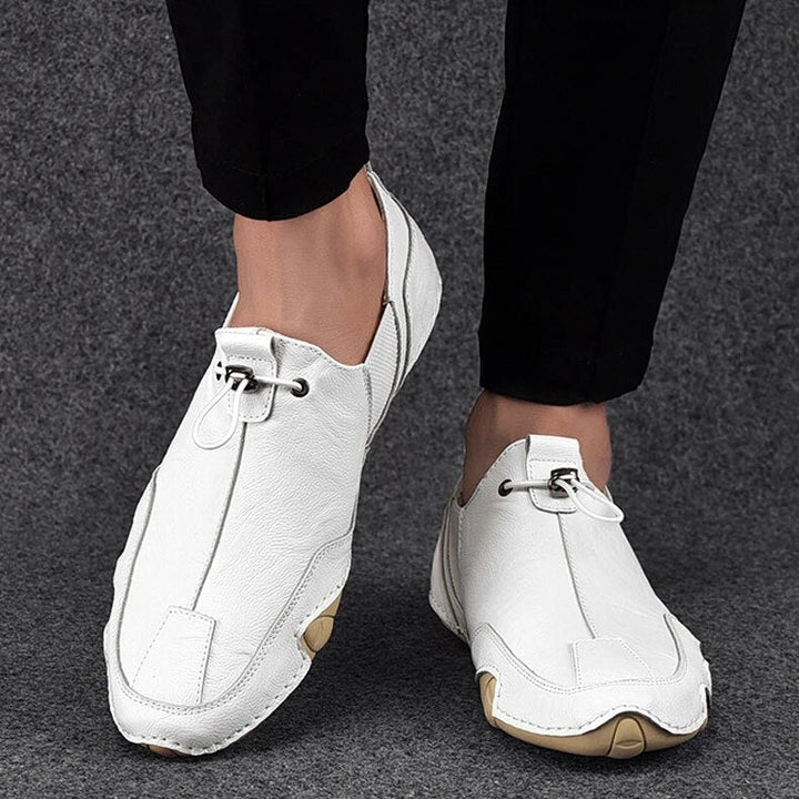Lightweight men's slip-on shoes featuring an adjustable lock closure for a custom, secure fit. Comfortable loafers.