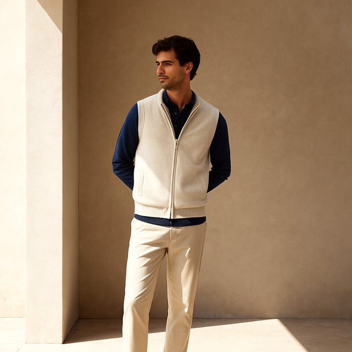 Men's full-zip layering vest with a sleek zipper closure. Soft & comfortable sleeveless outerwear for versatile style.