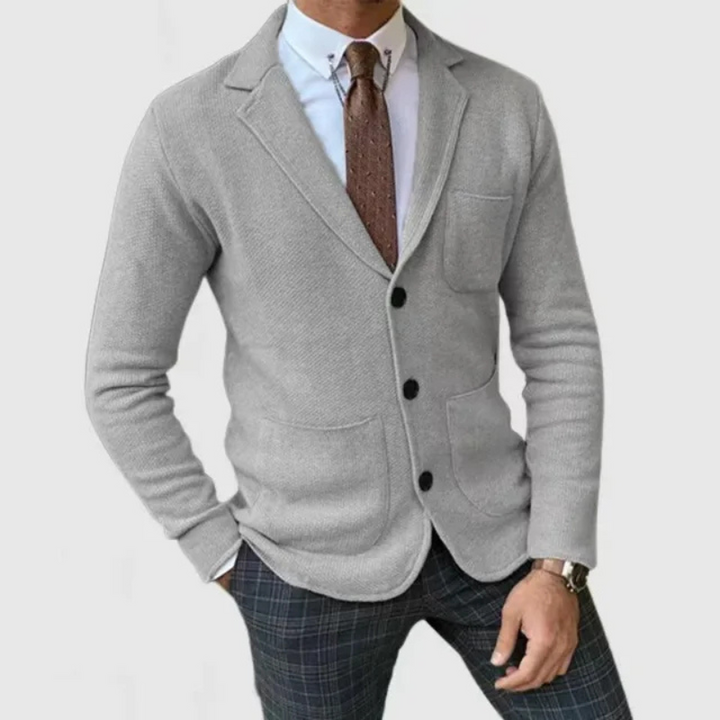 Formal men's outerwear blazer with button front and notch lapel, perfect for elegant fashion.
