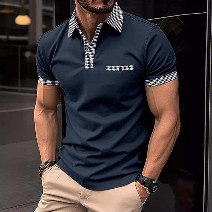 Folded men's sporty checkered polo shirt, showcasing its modern design. Ready for summer casual or golf wear.