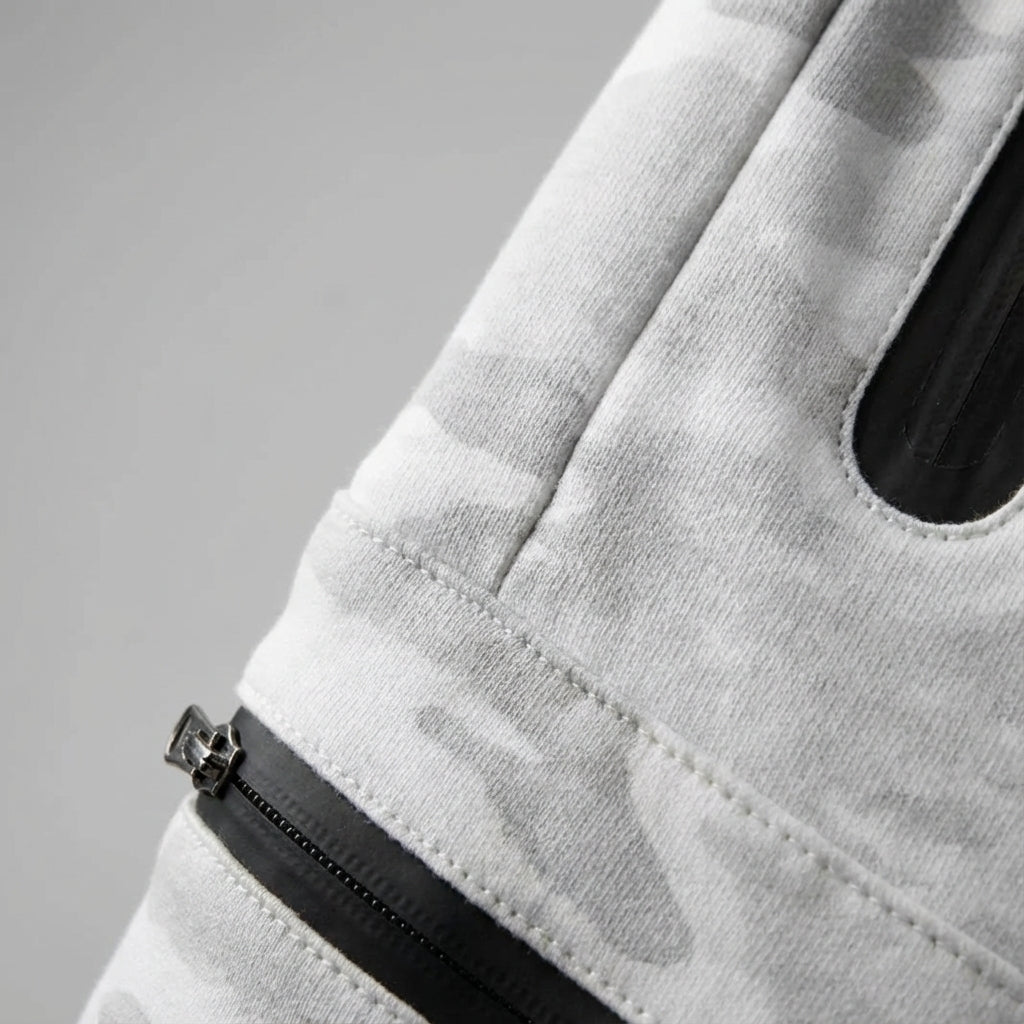 Comfortable men's athletic pants; tapered joggers for workouts or casual wear, complete with secure zipper pockets.
