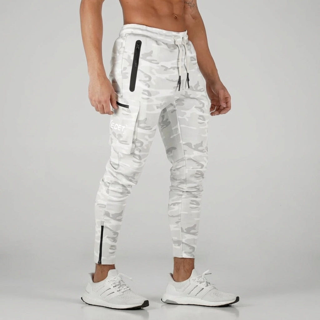Modern men's black joggers, tapered fit sportswear with secure zipper pockets, suitable for gym & everyday.