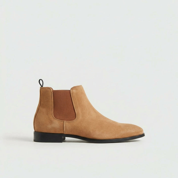 Men's Stratton Chelsea boots paired with denim, creating a smart-casual and comfortable everyday look.