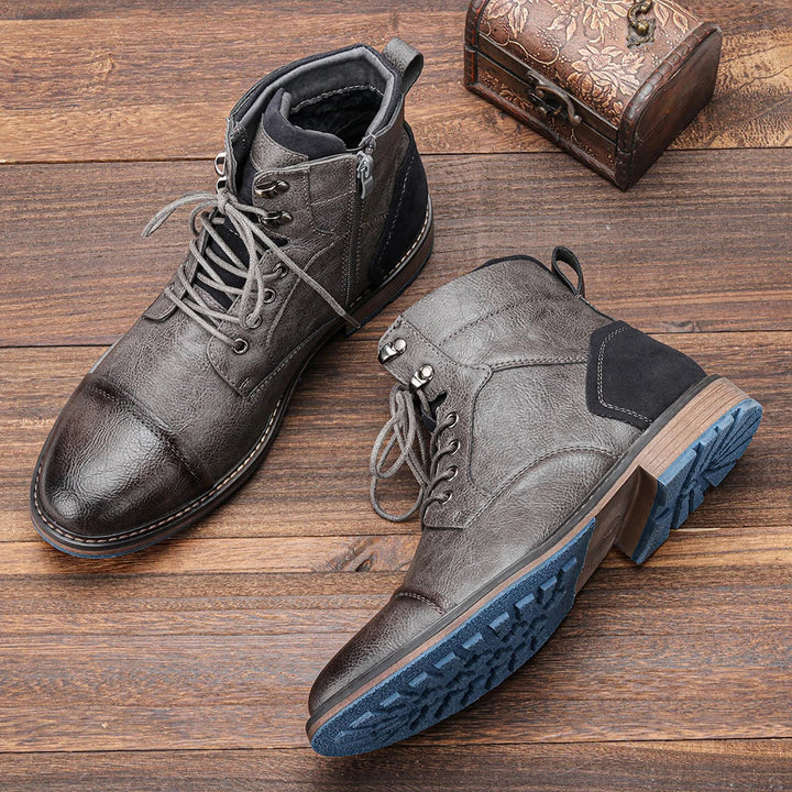 Gray mens lace-up ankle boots with a stylish cap toe, versatile footwear for everyday wear.