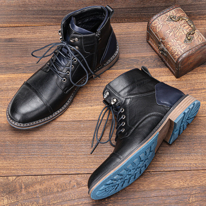 Classic men's lace-up cap toe ankle boots in premium leather, a stylish footwear choice.