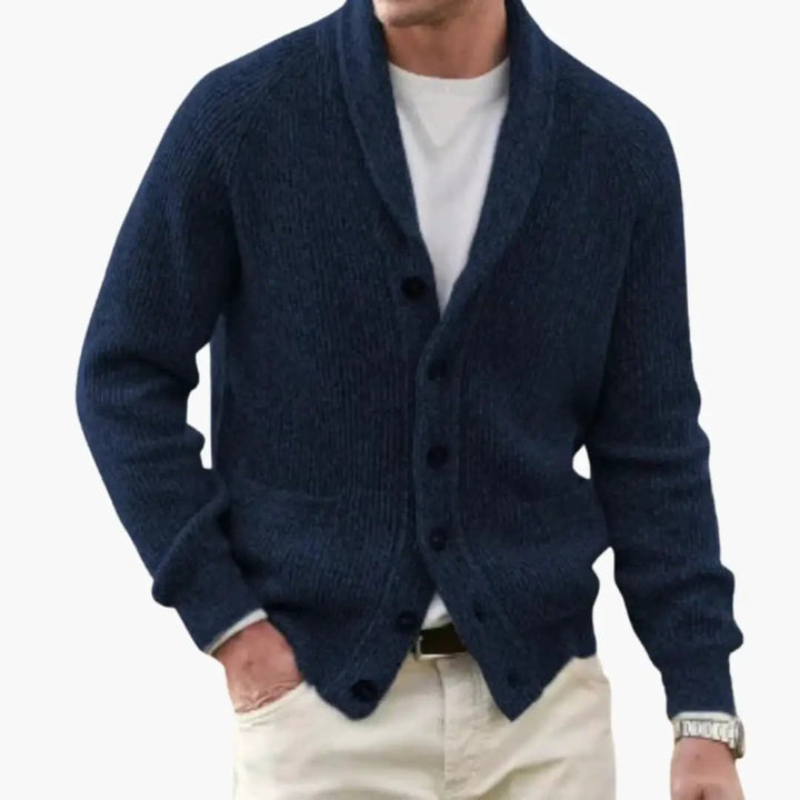 Detailed image of a men's button-front cardigan, featuring a classic shawl collar and ribbed cuffs.