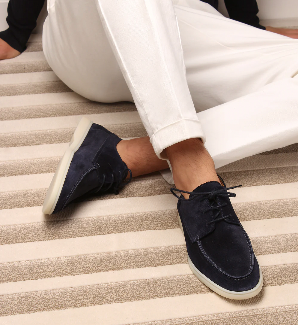 Men's stylish lace-up loafers, perfect for everyday comfort. Features a classic moc-toe design for casual wear.